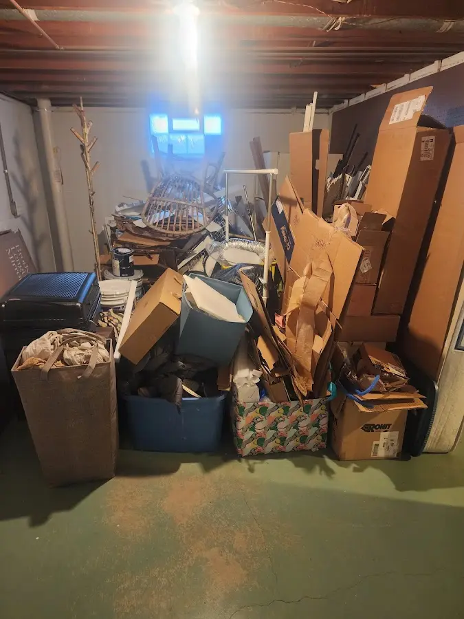 Roll-off dumpster container at job site for Construction Dumpster Rental in Great Bend